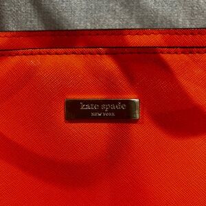 Kate Spade Vibrant Orange Handbag with Striped interior
